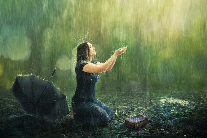 Woman and rain shower